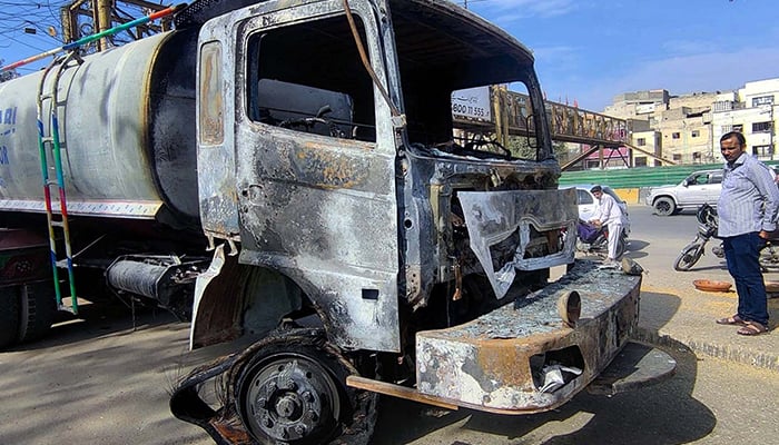 A torched dumper truck after a traffic accident in Karachi on February 18, 2025. — PPI