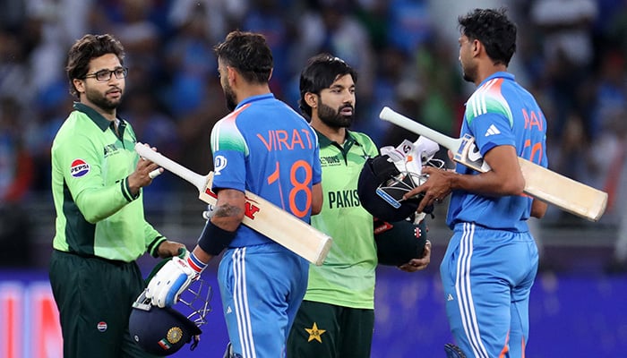 Indias Virat Kohli and Axar Patel shake hands with Pakistan players after the ICC Champions Trophy 2025 match at Dubai International Stadium. — Reuters/File