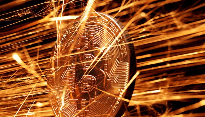 Sparks strike representation of cryptocurrency Bitcoin in this illustration taken November 24, 2024. — Reuters