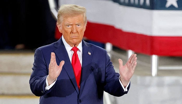 Republican then-presidential candidate and former US President Donald Trump gestures during a campaign event at Dorton Arena, in Raleigh, North Carolina, US November 4, 2024. — Reuters