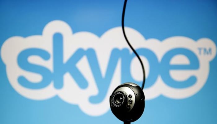 Logo of the communication site Skype is seen behind a webcam. — Reuters/File