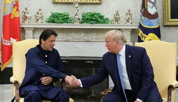 Former PM Imran Khan shakes hands with US President Donald Trump at the start of their meeting in the Oval Office of the White House in Washington, July 22, 2019. —Reuters