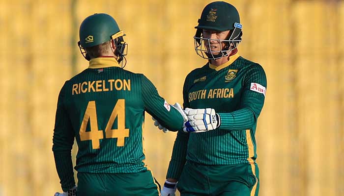 South Africas Rassie van der Dussen bumps fist with Ryan Rickelton during their ICC Champions Trophy clash with England at National Stadium, Karachi, March 1, 2025. — Reuters