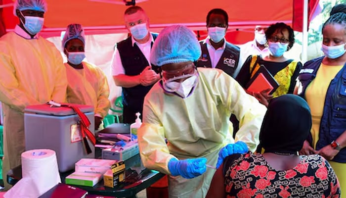 A Ugandan doctor vaccinates the contact of a patient who tested positive during the launch of the vaccination for the Sudan strain of the Ebola virus with a trial vaccine at the Mulago Guest House (Isolation centre) in Kampala, Uganda, February 3, 2025. — Reuters