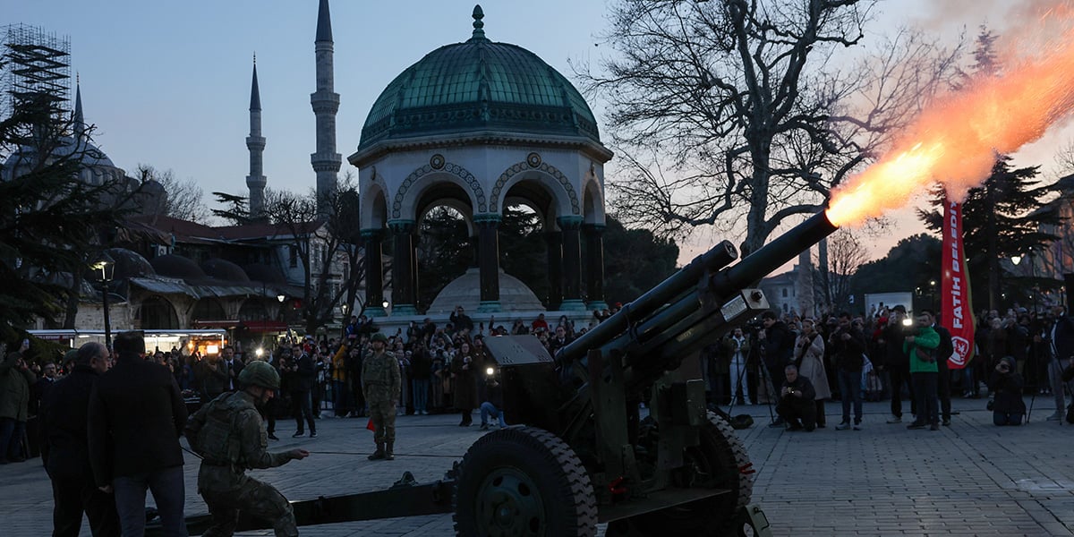 Turkish soldiers fire a cannon to mark the end of fasting on the first day of Ramadan, at Sultanahmet Square in Istanbul, Turkey, March 1, 2025. — Reuters