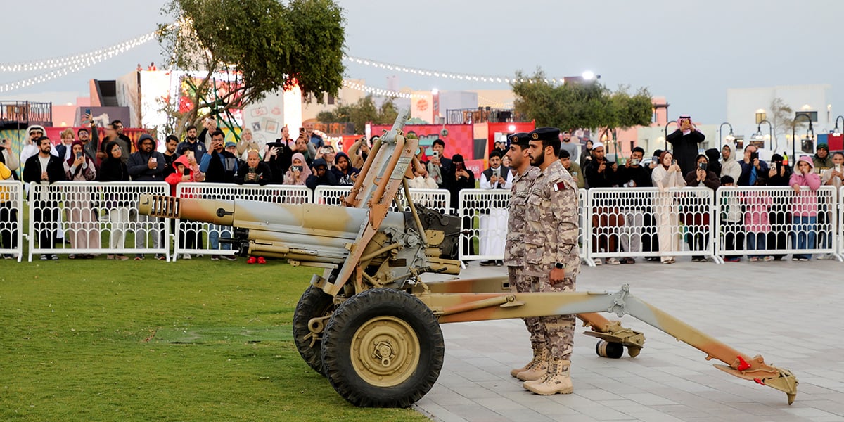 Qatari policemen prepare to fire a cannon to announce the time for the breaking of the fast in Doha, Qatar, March 1, 2025. — Reuters