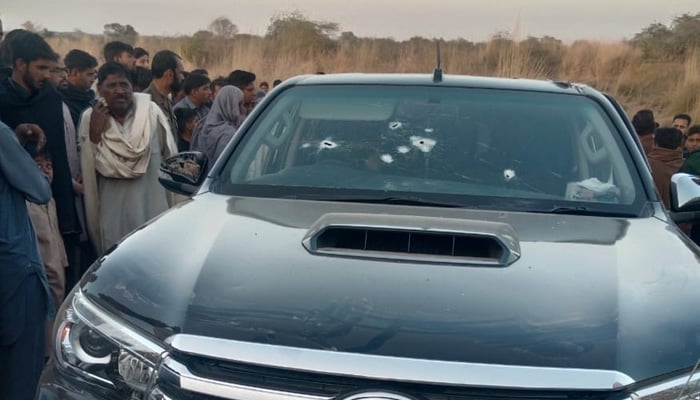 Ball marks can be seen on the windshield of cars after shooting by unidentified attackers in Gujrat, Punjab, March 2, 2025. - Reporter