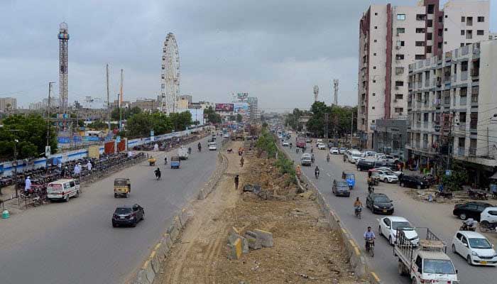 Construction works of new development projects underway on University road in Karachi on August 20, 2024. — PPI