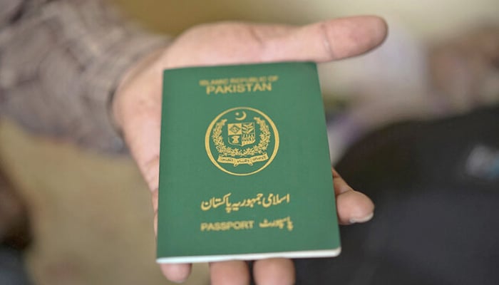 This photo taken on November 3, 2018 shows a Pakistani passport. — AFP