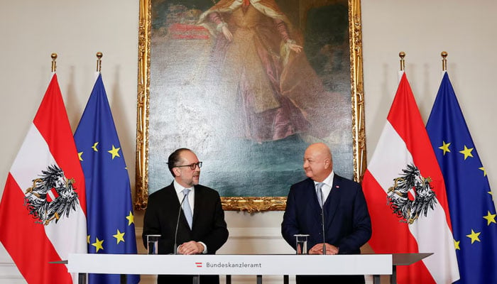 Austria’s caretaker Chancellor Alexander Schallenberg and the newly sworn-in Chancellor and head of People’s Party (OeVP) Christian Stocker make statements, in Vienna, Austria, March 3, 2025. — Reuters