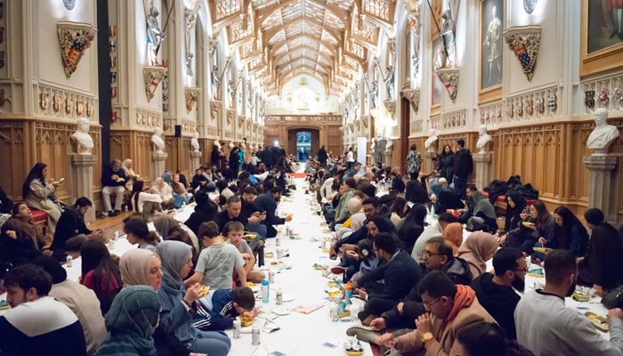 People breaking fast inside Windsor Castles State Apartments. — Reporter