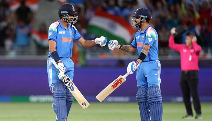 Indias Axar Patel and Virat Kohli interact during ICC Champions Trophy semi-final against Australia at Dubai International Stadium, Dubai, United Arab Emirates, March 4, 2025. — Reuters