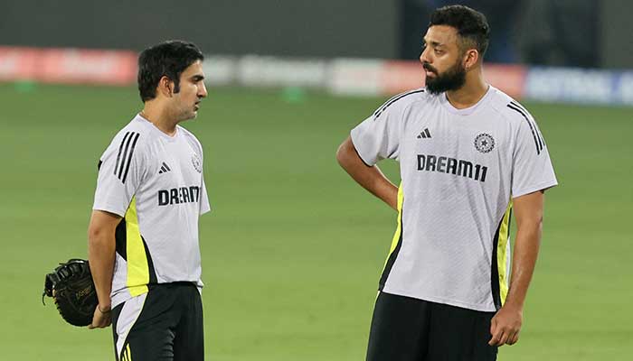 India coach Gautam Gambhir and Varun Chakaravarthy during practice session at Barabati Stadium, Cuttack, India, February 8, 2025. — Reuters