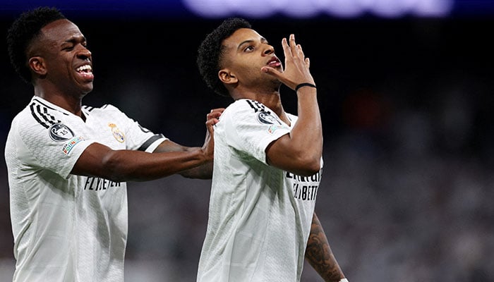 Real Madrids Rodrygo celebrates scoring their first goal with Vinicius Junior in a match against Atletico Madrid in Santiago Bernabeu, Madrid, Spain on March 4, 2025 . — Reuters