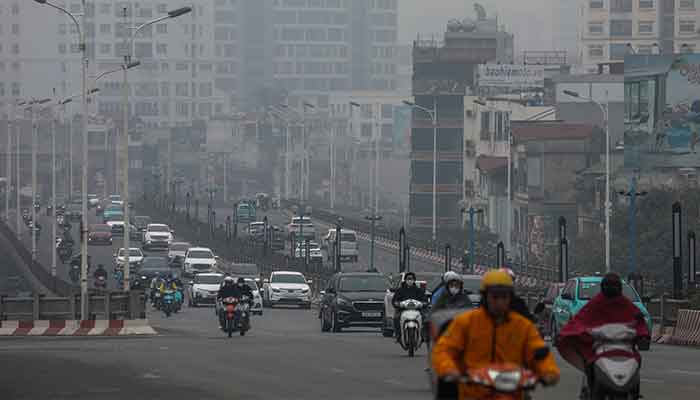 People commute amid air pollution in Hanoi, Vietnam, February 12, 2025. — Reuters