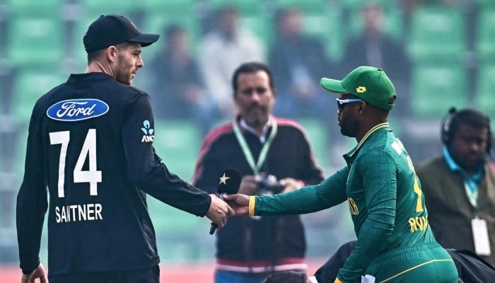 Mitchell Santner and Temba Bavuma at the toss, New Zealand vs South Africa, Pakistan tri-series, Lahore, February 10, 2025. — AFP