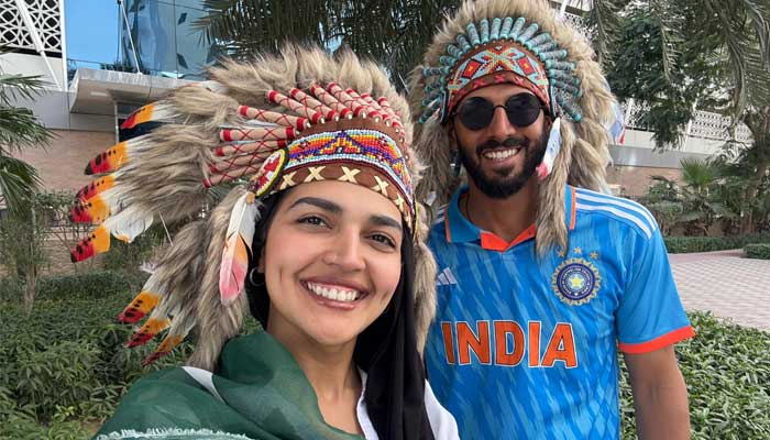 Dubai-based educationist of Pakistani origin and cricket fan Faryal Waqar can be seen with a friend before the Champions Trophy 2025 match between Pakistan and India, outside the Dubai International Stadium on February 23, 2025. — Reporter