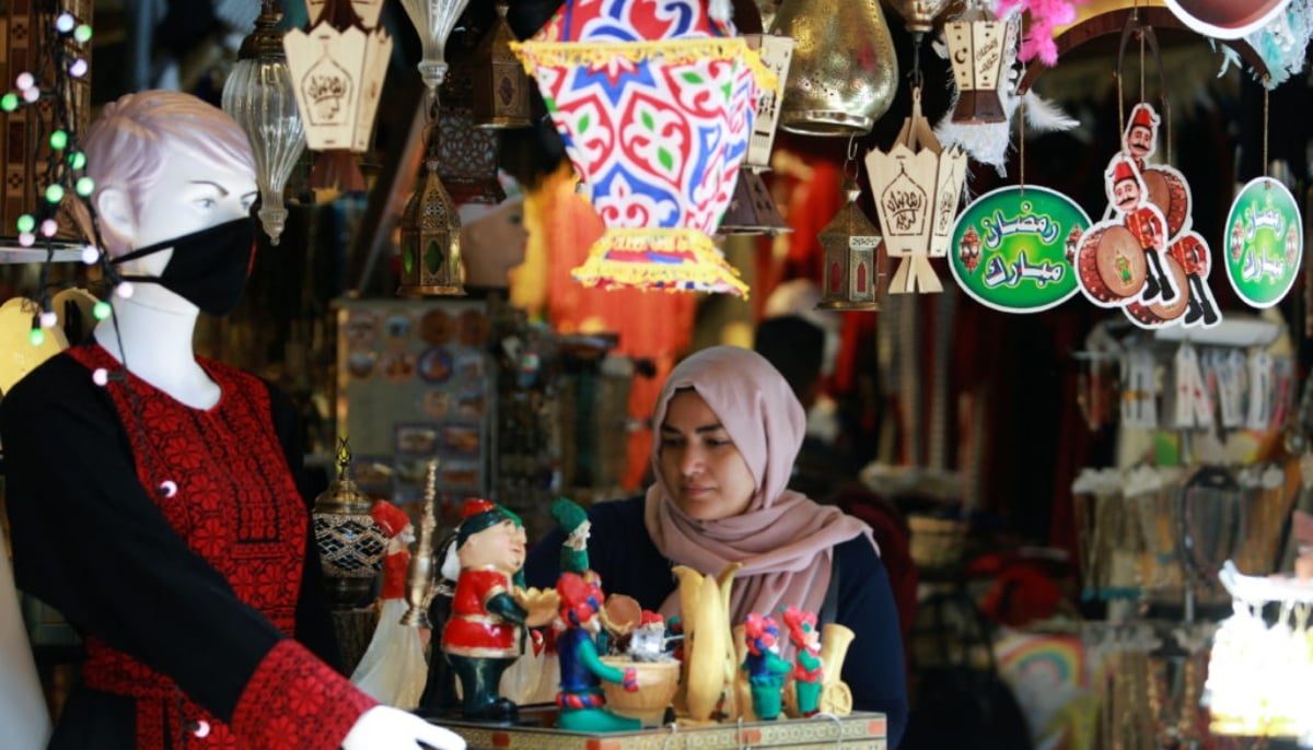 A woman checks for Ramadan decorations ahead of the holy fasting month of Ramadan at a souk in Sidon, Lebanon March 30, 2022. — Reuters