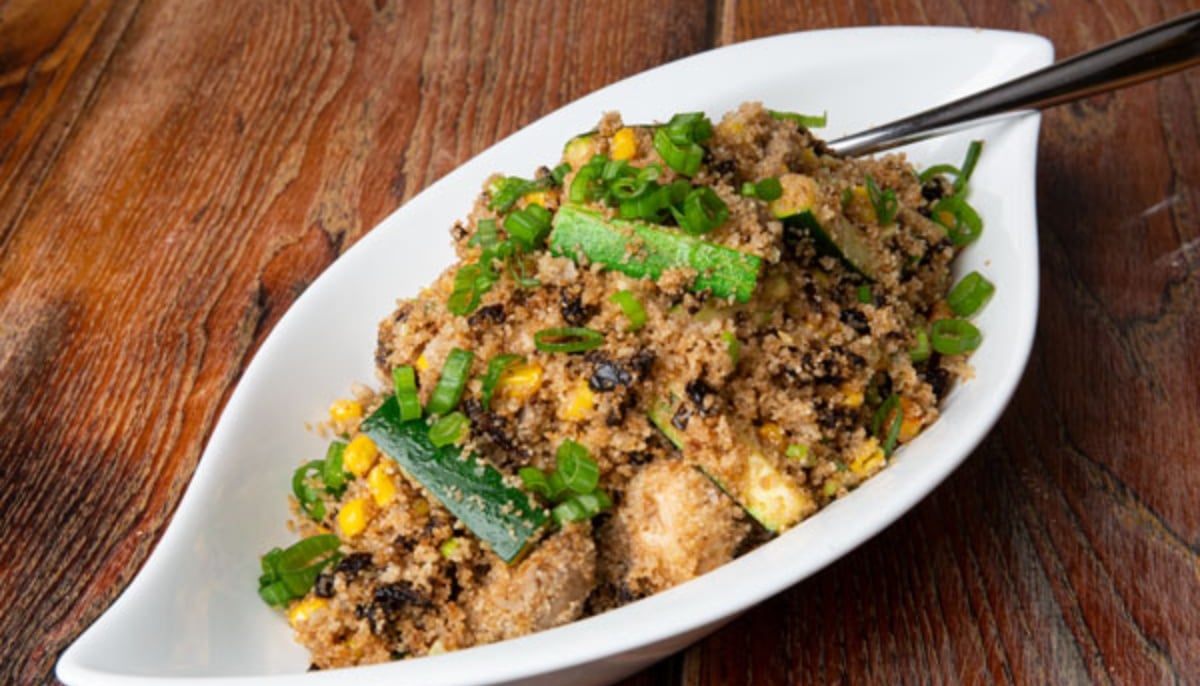 A traditional summer fonio pilaf from Guinea. —Woodland Gourmet