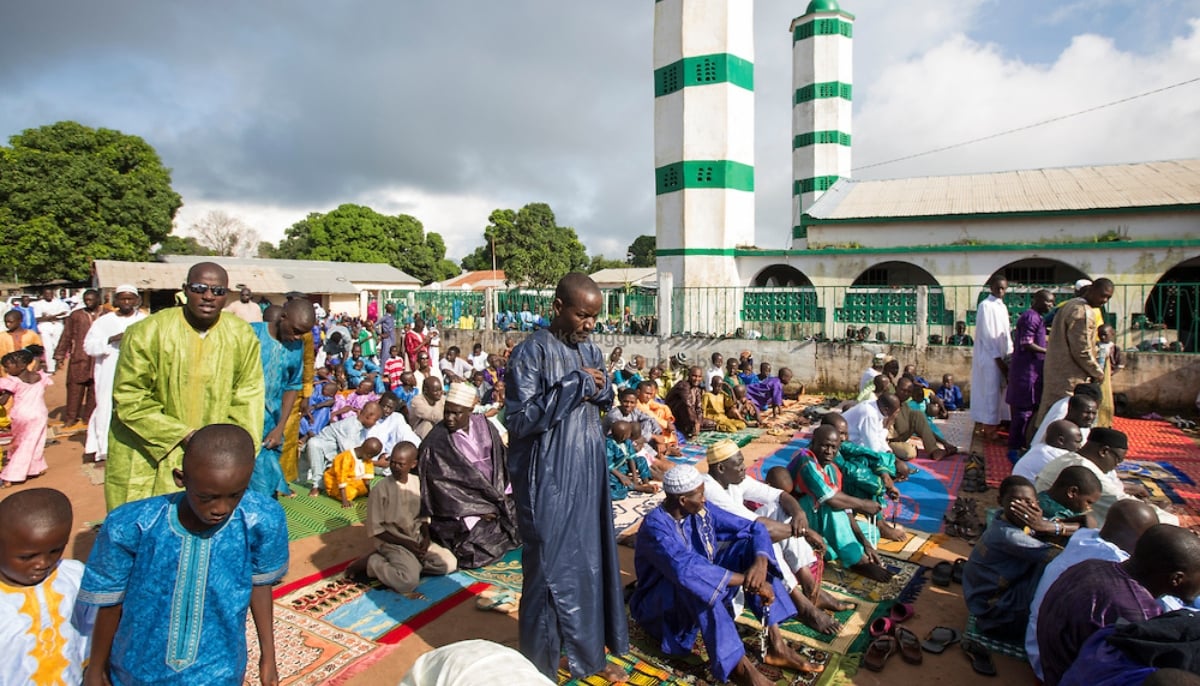 Men are praying at a masjid in Gambia. — Gambiana