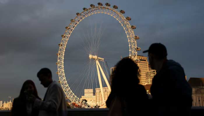 People look at the London Eye in London, Britain, October 26, 2024. — Reuters