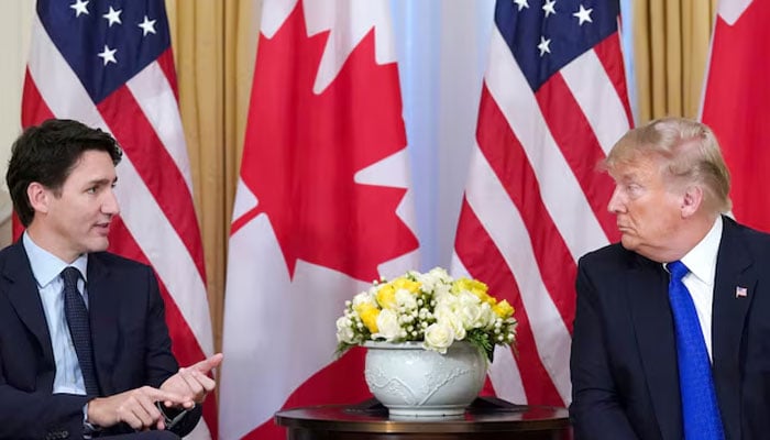 US President Donald Trump (right) and Canadas Prime Minister Justin Trudeau hold a meeting ahead of the NATO summit in Watford, in London, Britain, December 3, 2019. — Reuters