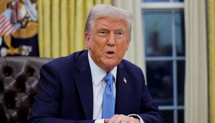 US President Donald Trump looks on as he signs an executive order in the Oval Office at the White House in Washington, US, January 31, 2025. — Reuters