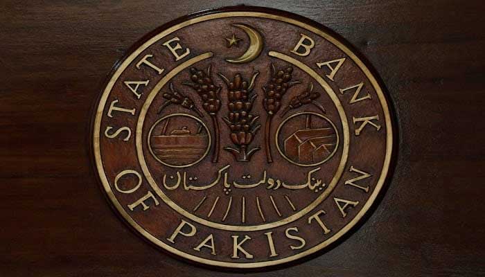 A logo of the State Bank of Pakistan (SBP) is represented on a reception at the headquarters of Karachi, Pakistan, July 16, 2019. - Reuters