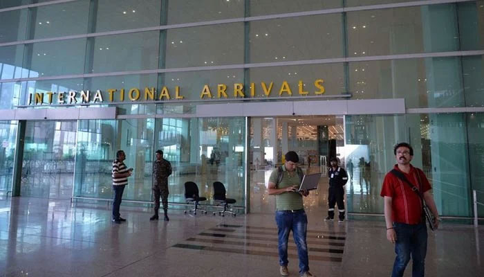 A photograph of the Islamabad airport shows travellers at the international arrival gate. — AFP/File