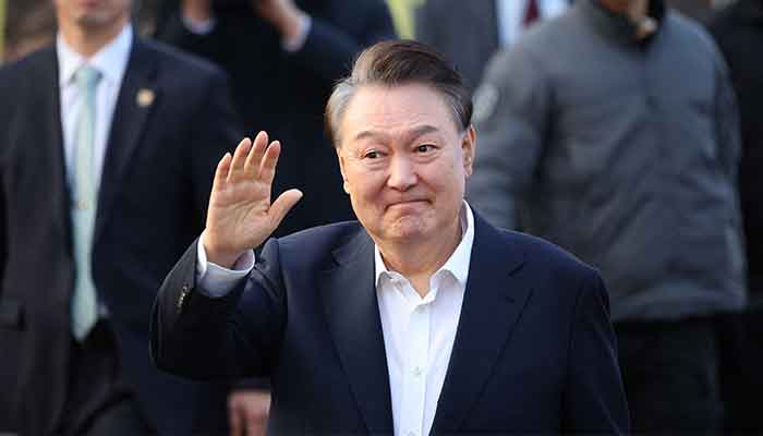 South Korean impeached President Yoon Suk Yeol reacts outside the Seoul detention centre after his release, in Uiwang, South Korea, March 8, 2025. — Reuters