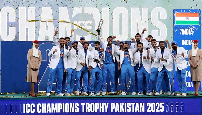 India players celebrate with the trophy on the podium after winning the ICC Mens Champions Trophy at Dubai International Stadium, Dubai, United Arab Emirates, March 9, 2025. — Reuters