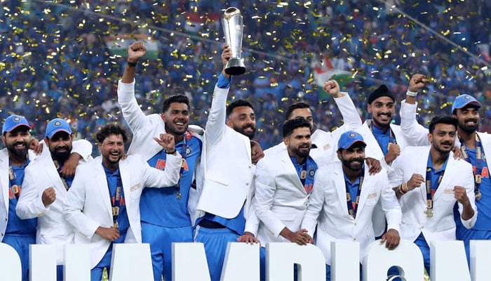 India players celebrate with the trophy on the podium after winning the ICC Mens Champions Trophy at Dubai International Stadium, Dubai, United Arab Emirates, March 9, 2025. — Reuters