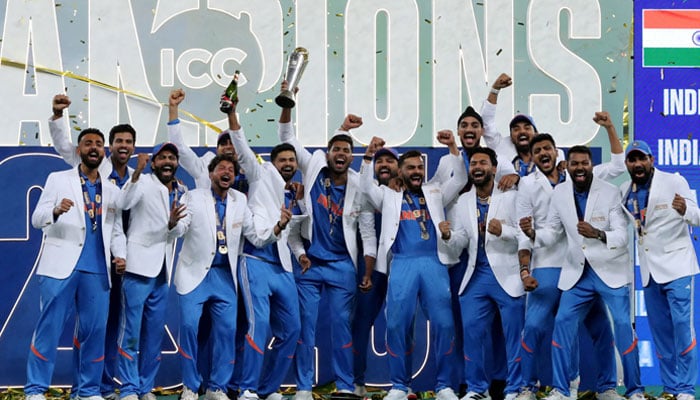 India players celebrate with the trophy on the podium after winning the ICC Mens Champions Trophy at Dubai International Stadium, United Arab Emirates on March 9, 2025. — Reuters