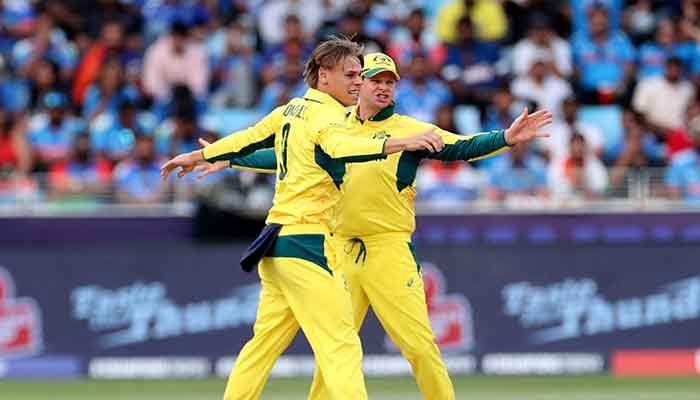 Australias Cooper Connolly celebrates with Steve Smith after taking the LBW wicket of Indias Rohit Sharma in ICC Mens Champions Trophy, March 4, 2025. — Reuters