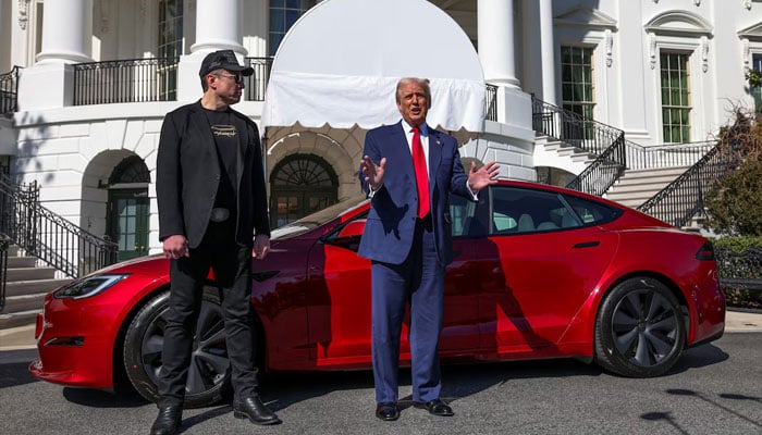 US President Donald Trump talks to the media next to Tesla CEO Elon Musk, at the White House in Washington, DC, US, March 11, 2025. — Reuters