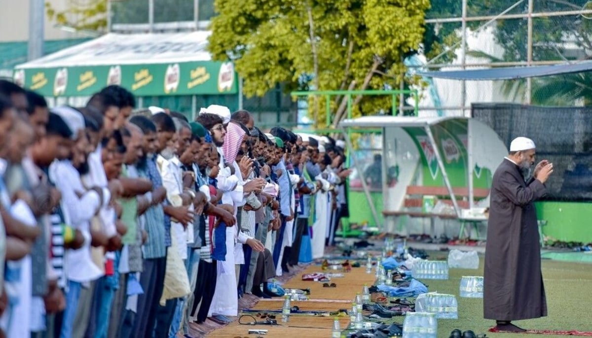 Men perform prayer in congregation on a street in Maldives. — Hawzah News Agency/File