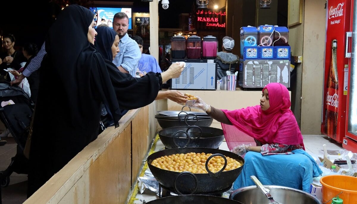 Women buy sweets at a dessert shop during the holy month of Ramadan, in Dubai, United Arab Emirates, March 28, 2023. — Reuters