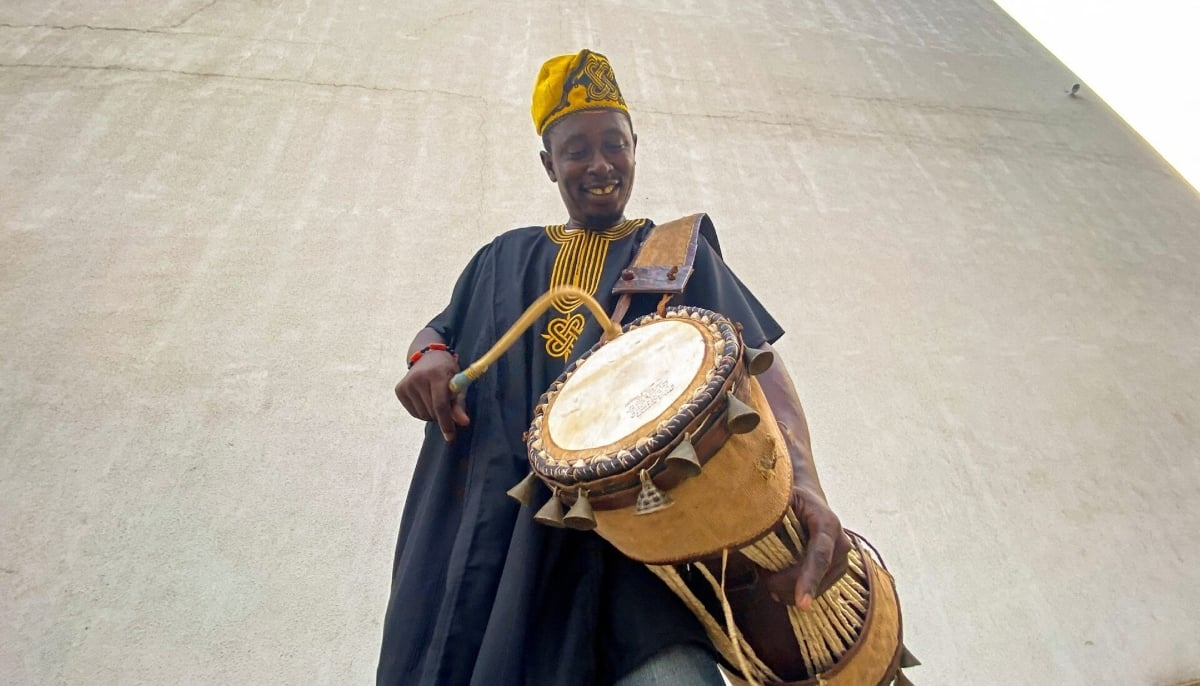 Nigerian drummer Adebayo Ayodeji performs during a drumming workshop for children in Lagos, Nigeria February 4, 2023. — Reuters