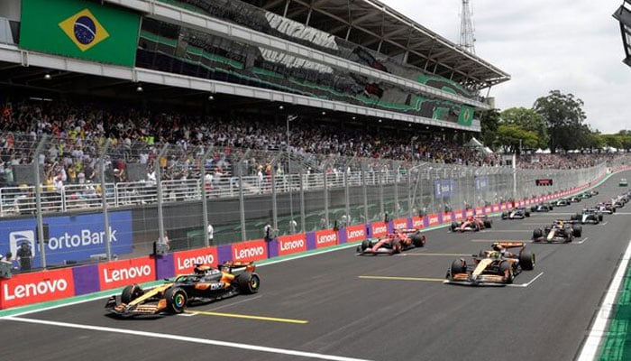 Formula One F1 - Sao Paulo Grand Prix - Autodromo Jose Carlos Pace, Sao Paulo, Brazil - November 2, 2024 McLarens Lando Norris, McLarens Oscar Piastri, Ferraris Charles Leclerc and drivers line up at the start of sprint race. —Reuters