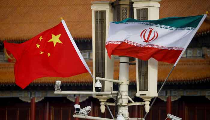 The national flags of China and Iran fly in Tiananmen Square during Iranian President Ebrahim Raisis visit to Beijing, China, February 14, 2023. — Reuters