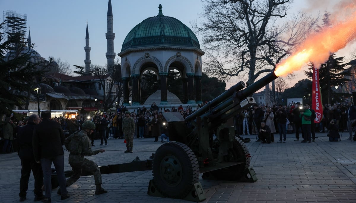 Turkish soldiers fire a cannon to mark the end of fasting on the first day of the holy month of Ramadan, at Sultanahmet Square in Istanbul, Turkiye, March 1, 2025. — Reuters