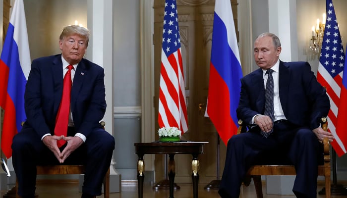 President Donald Trump, during his first term as US president, meets with Russian President Vladimir Putin on July 16, 2018. — Reuters