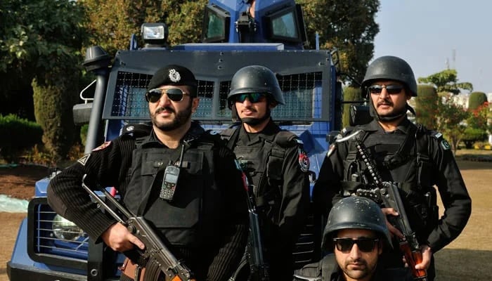 Police personnel stand guard in this undated photo. — KP Police website