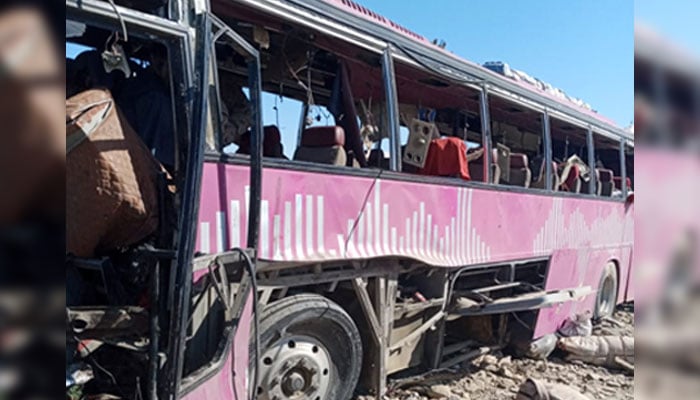 Remnants of the damaged bus after a nearby explosion on Nushki-Dalbandin highway on March 16, 2025. — Reporter