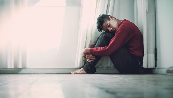 A representational image of a man with depression. — Unsplash/File