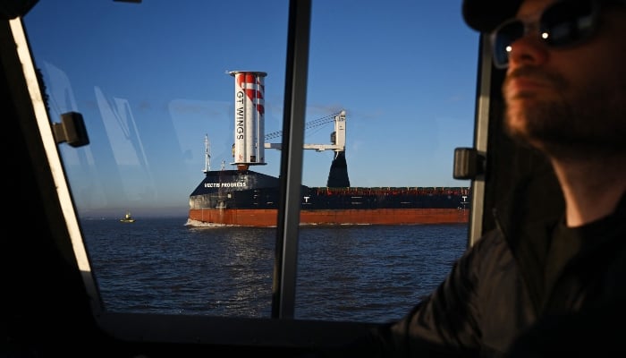 The Vectis Progress, a 124m long cargo ship fitted with an experimental sail, the AirWing, on the River Humber after leaving port in Kingston upon Hull in north east England on March 2, 2025. — AFP