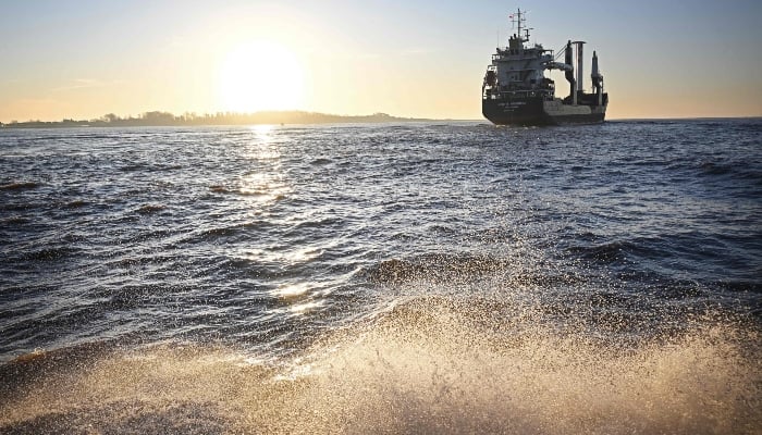 The Vectis Progress, a 124m long cargo ship fitted with an experimental sail, the AirWing, on the River Humber after leaving port in Kingston upon Hull in north east England on March 2, 2025. — AFP