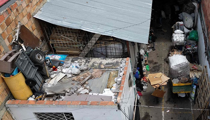 Aerial view showing a recycling warehouse in Bogota on February 26, 2025. — AFP