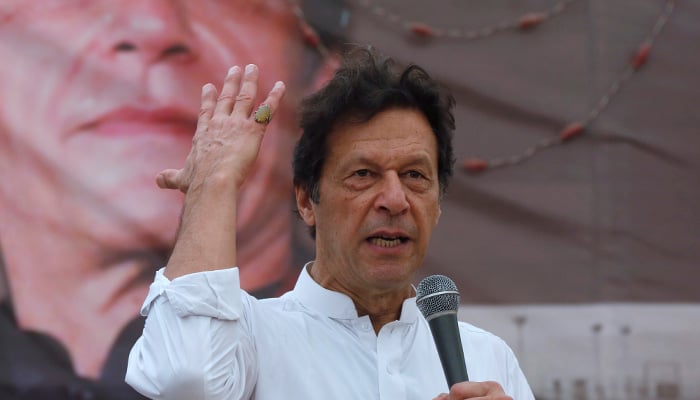 Imran Khan, founder of Pakistan Tehreek-e-Insaf, gestures while addressing his supporters during a campaign meeting ahead of general elections in Karachi, Pakistan, July 4, 2018. — Reuters