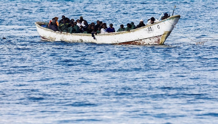 A Spanish Coast Guard vessel tows a fibreglass boat with migrants onboard to the port of Arguineguin, on the island of Gran Canaria, Spain, December 25, 2024. — Reuters